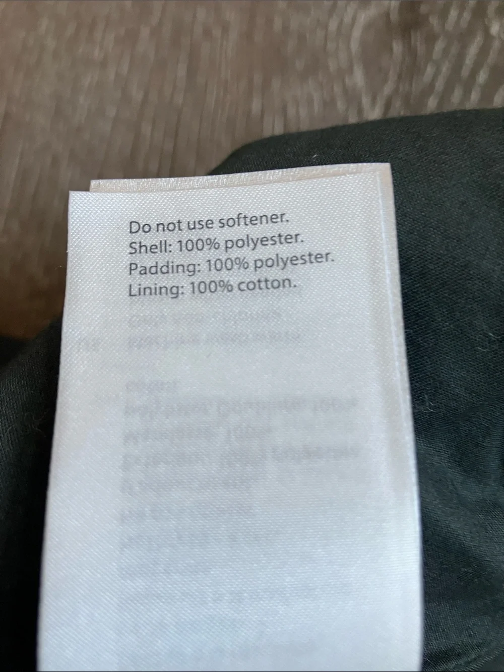 dark green COS high-neck padded vest